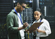 © CineLens2024/peopleimages.com - Computer center, team and data engineer with checklist, collaboration and people as programmer. Technician, clipboard and hardware security in server room for system update, analytics or maintenance