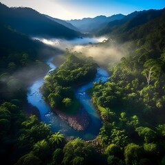 Wall Mural - Aerial view of a river in the mountains at sunrise. Beautiful landscape.