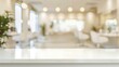 © Anzhela - Empty white tabletop on blurred spa salon background for display your product