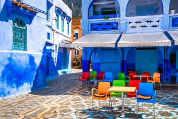 Street cafe on the square in the blue city of Chefchaouen. Location: Chefchaouen, Morocco, Africa. Artistic picture. Beauty world