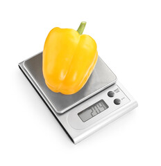 Wall Mural - Kitchen scale with bell pepper isolated on white