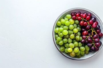 Bowls of green and red grapes on white background. Flat lay composition with copy space. Fresh fruit design for poster, wallpaper, banner, greeting card, invitation, postcard.