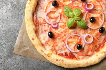 Wall Mural - Delicious vegetarian pizza on grey table, top view