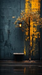 Wall Mural - a tree with yellow leaves sitting on a bench next to a street lamp