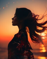 Poster - silhouette of a woman with her hair blowing in the wind at sunset