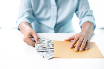 Wall Mural - Woman carefully counted the dollar bills in her hand, managing her finances and saving money for future expenses. dollar, hand, money, cash, woman, finance, currency, bill, banknote, saving, business.