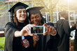© peopleimages.com - Happy girl, students and graduation with selfie for memory, photography or picture at university. Excited female person, friends or young graduates with smile for moment, degree or diploma on campus