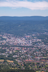 Wall Mural - Aerial view of the city of Liberec in Czech republic from the peak of Jested mountain and famous Jested tower