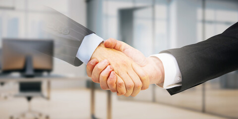 Wall Mural - Two people shaking hands in an office setting, with a handshake graphic overlay, on a blurred office background, concept of business agreement