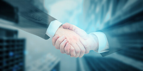 Aufkleber - Two individuals shaking hands in a blurred office setting, embody the concept of successful business agreements