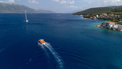 Wall Mural - tender boat in the sea