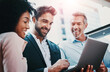 © BestLens/peopleimages.com - Business people, laptop and happy with research in collaboration for website review and reading project feedback. Marketing team, employees and technology for b2b networking or planning ideas at work