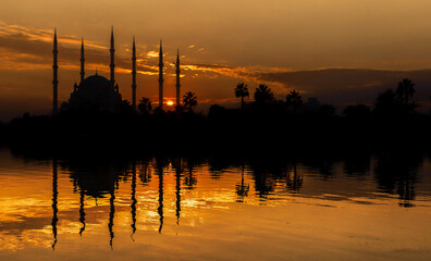 Wall Mural - Sabanci Central Mosque (Turkish: Sabanci Merkez Cami) and Seyhan River in Adana, Turkey. Turkey's largest mosque with blue sky.