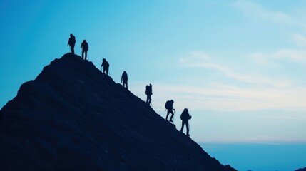 group of hikers silhouetted against a blue sky, climbing a steep mountain slope, showcasing adventur