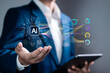 © Pakin - Data processing by AI, big data technology and data science. Businessman with artificial intelligence AI circuit board for analyze data automated chart graph.