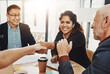 © peopleimages.com - Business people, meeting and shaking hands in agreement for funding, teamwork or partnership. Collaboration, happy and investment banker greeting manager for financial advice and negotiation deal