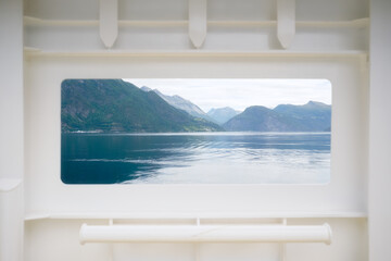 Wall Mural - norway. nature in fjords. view fron the ship. high mountains and reflections on the surface of the w