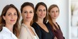 © Anastasiia - Professional group of businesswomen in office demonstrating unity teamwork and professionalism. Concept Business Women, Professionalism, Teamwork, Unity, Office Environment