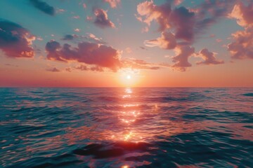 Poster - A serene scene of the sun setting over the ocean on a cloudy day, perfect for calming backgrounds or tranquil atmosphere