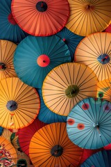 Poster - A vibrant and playful display of colorful umbrellas suspended from the ceiling, perfect for adding a pop of color to any room or event