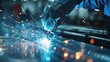 © Alice a. - A man is welding a piece of metal. The sparks and heat from the welding process create a sense of danger and excitement. Concept of hard work and dedication