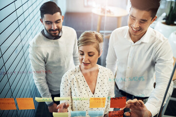 Poster - Business people, brainstorming and planning with glass board, project strategy or sticky note in office. Lens flare, diversity and employees in meeting for writing ideas, agenda or collaboration