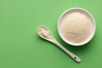 Sticker - hydrolyzed collagen powder in bowl and spoon - Organic gelatin powder