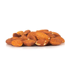 almond isolated on white background pile