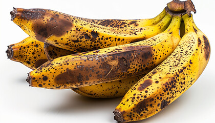 Bunch of overripe bananas with dark spots on a white background sweet and natural healthy fruit ready to eat