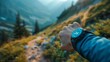 © Trichaiwat - Closeup on fitness tracker app displaying a completed run, blurred background shows a scenic mountain trail