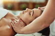 © NonVig/peopleimages.com - Hands, massage and face of woman for relax, beauty and treatment for client on bed. Towel, spa or lymphatic drainage in salon by masseuse person, facial or stress relief for cosmetic therapy service