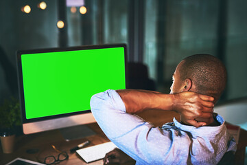 Canvas Print - Businessman, night and neck pain with green screen on computer for stress, burnout or fatigue at office. Back view of man or employee working late with technology or mockup space for ache or injury