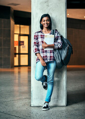 Poster - Indian girl, student and happy on campus with book for learning, studying and education at university. Person, portrait and backpack with novel for exam information, college scholarship and knowledge