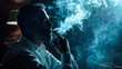 © Peachaya - A man smokes a cigarette in dramatic scene, the smoke curling around his face. The concept of contemplation, habit, and the stark reality of smoking. Generative AI.