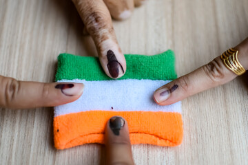 young voter showing her ink-marked fingers after casting votes near polling booth of east delhi, ind