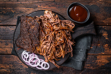 Canvas Print - Traditional barbecue wagyu pulled beef on wooden board. Wooden background. Top view