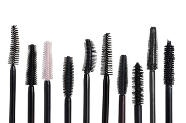 Selection of various mascara brushes isolated on white