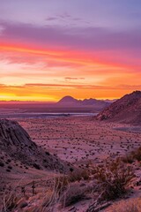 Wall Mural - Radiant orange and pink sunset casting a fluorescent glow over a tranquil, desert landscape, Generative AI 