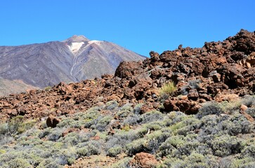 Scenic view of volcanic rock formations in desert during sunny day, Teide National Park, Tenerife