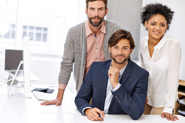 Wall Mural - Team, diversity and business people in portrait with mission, friendly and commitment at work. Human resources, staff and happy face for collaboration for support and solidarity in office by table