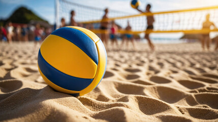 Beach volleyball sport. Close up of ball on the beach with volleyball net and players in the background, summer sport