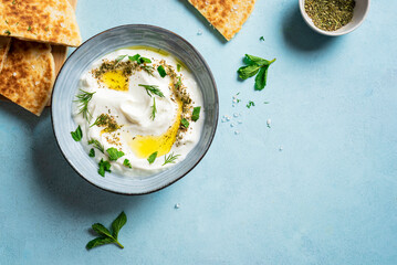 Wall Mural - Labneh yogurt cream cheese dip with pita bread