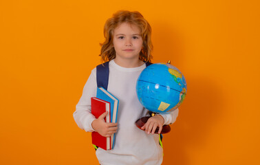 Aufkleber - School boy world globe and book. School kid 7-8 years old with book go back to school. Little student in school. Education concept.