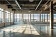 © DeepView - Bright and airy interior empty industrial nave offices with large windows and high ceilings , sunlight streaming in