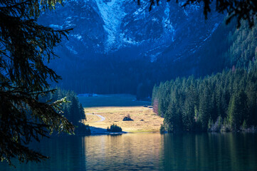 Morning in the Fusine lakes valley. Autumn reflections.