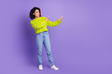 Wall Mural - Photo portrait of beautiful charming youth girl in bright yellow knitted sweater introduce courses academy isolated on purple color background