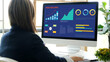© mangpor2004 - Woman analyze data, business plan information and business growth chart to analysis for project strategy on computer at office