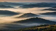 © Marius - a misty mountain in the early morning with the first