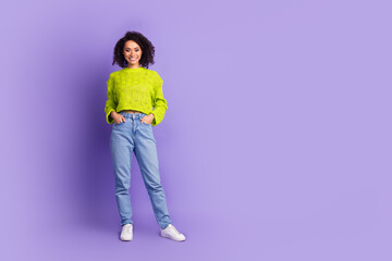 Wall Mural - Full body photo of attractive young woman posing model dressed stylish green clothes isolated on violet color background
