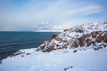 Wall Mural -  New Teriberka, Barents Sea winter bay. Kola Peninsula landscape. Russia